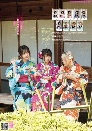 A group of three women in bikinis sitting next to each other.