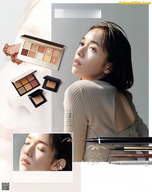 A magazine page with a picture of a woman's face and lipsticks.